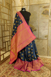Dark blue banarasi with dark pink border and dark pink Pallu with rich golden work all over Pallu